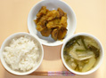 レンコンのほくほく煮と玉ねぎ・白菜・えのき等の味噌汁と胚芽米ごはん